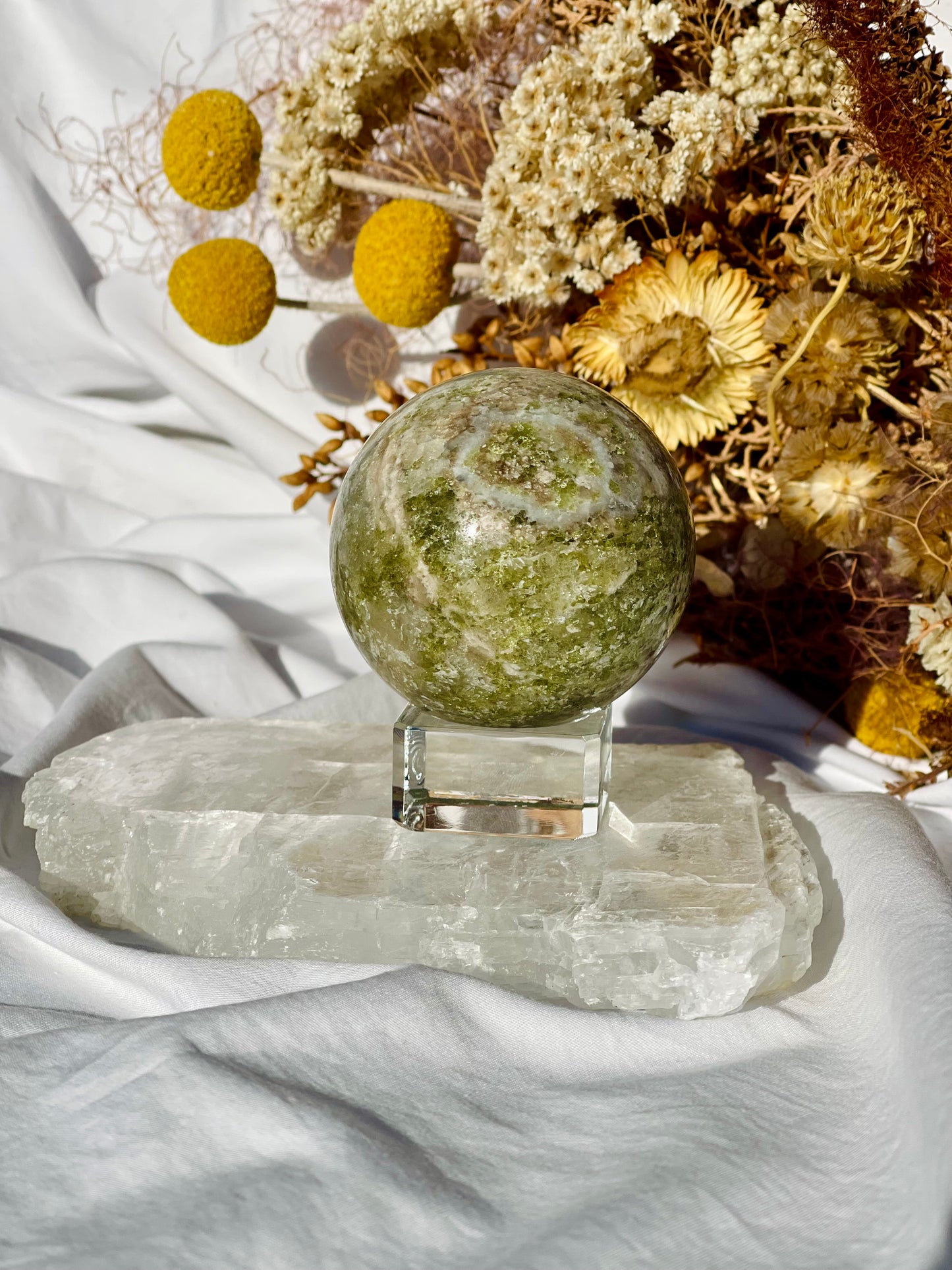 Peridot With Blue Calcite Sphere