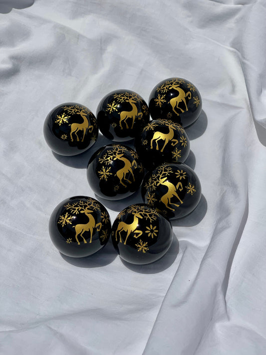 Gold Reindeer Etched Obsidian Sphere